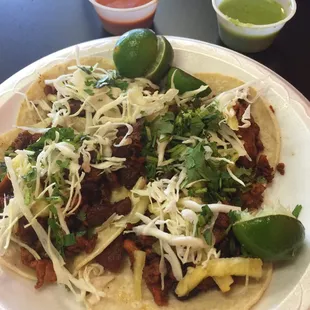 Tacos Al pastor..  Don't let the picture full you.  These are very small tacos.