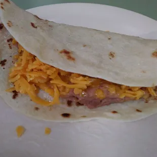 Bean and cheese taco was yummy. Tortillas are on point and they are not stingy on the cheese lol. Great place.