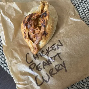 Chicken peanut curry empanada