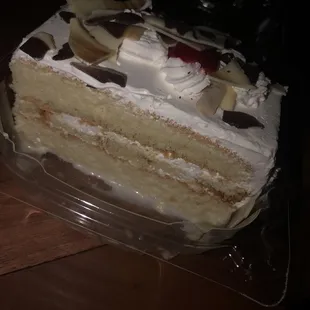 Pastel Tres Leches. I only had 3 bites. It was packed for DoorDash w/o utensils.