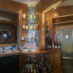 a bar with bottles of liquor