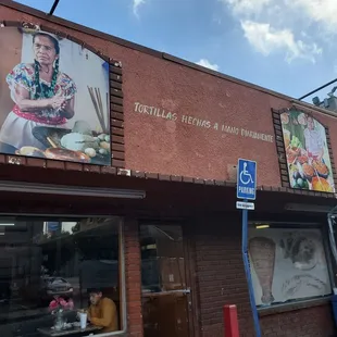 a woman cooking outside