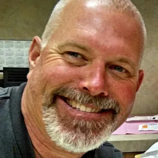 Mark L.