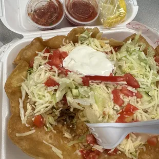 Very good tostada compuesta, shredded beef is the meat I chose and I added the rice to it