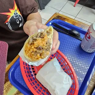 Asada burrito with just meat,  beans,  and rice.