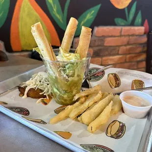 Sampler with yuca Fries, fried plantains and tequenos