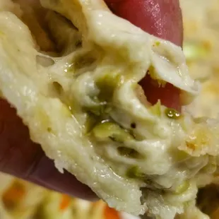 Pupusa interior. The best pupusa I have EVER had. Don't miss out!