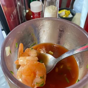 a bowl of soup with a spoon in it