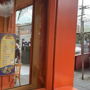 a sign in the window of a restaurant