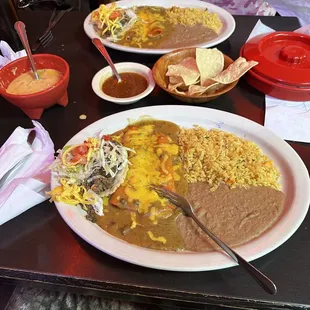 Number two special very tasty enchiladas and puffy taco the queso and chips are awesome along with the rest. Beans and rice perfect