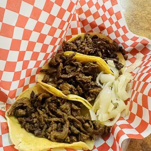Asada tacos as you can see full of meat comes with two corn tortillas can actually make 6 of them