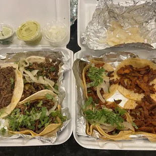 Barbacoa, Carne Asada, and Trompo. Toppings served on the side. Delicious!