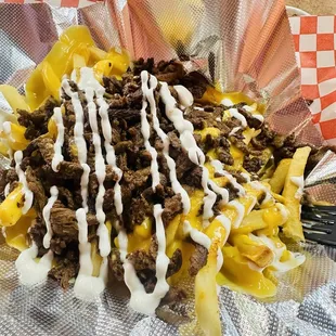 Asada fries fresh every time they put pico and jalapeño just don't like them