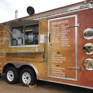 a food truck parked in front of a building