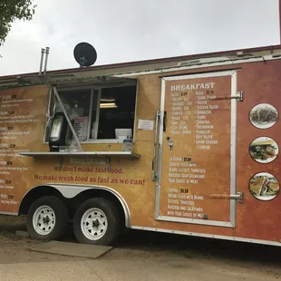 a food truck parked in front of a building