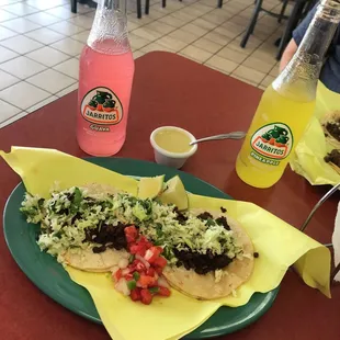 Two of the best pastor tacos in town!