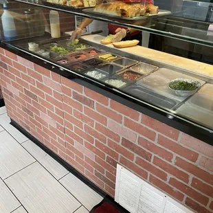 a brick wall and a buffet