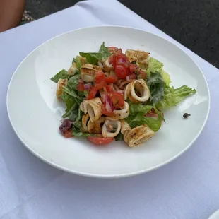 a plate of salad on a table