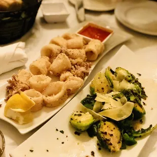 Their Fried Calamari is perfection! The partially eaten Brussel Sprouts were good too.