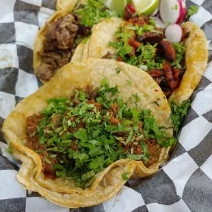 Pastor, barbacoa, and asada tacos. Asada was the best of all the tacos.