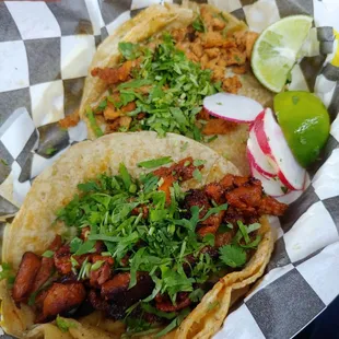 Pastor and pollo tacos. Pastor was the better of them.