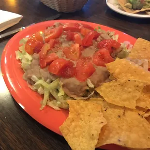 Taco salad with beans, no cheese &amp; sour cream.