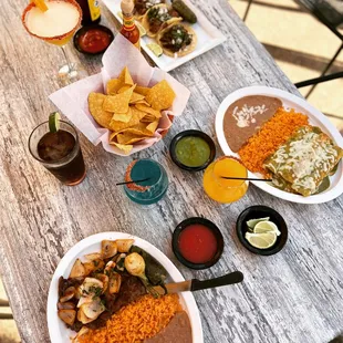 a table full of mexican food
