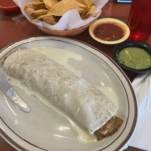 Burrito California (chicken and steak, no tomatoes, add fresh jalapeños)