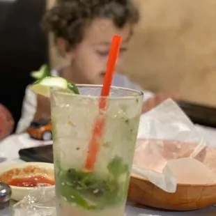 a young child sitting at a table