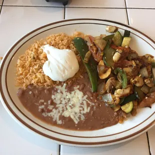 Vegetarian fajitas, rice, and beans. Perfect for a lighter lunch.