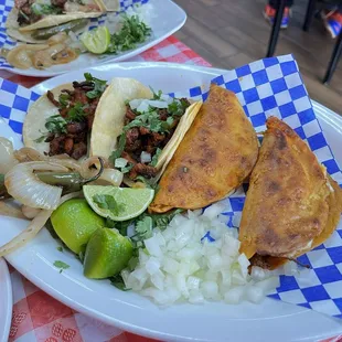 Tacos al pastor (left), and birria queso tacos (right).