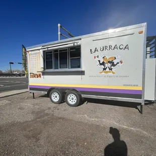 a food truck parked in a parking lot