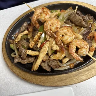 Shrimp, beef, chicken fajitas