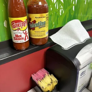The hot sauces on the table