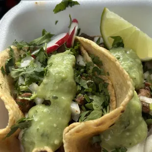 Asada tacos to go with green salsa