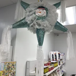 a snowman hanging from the ceiling