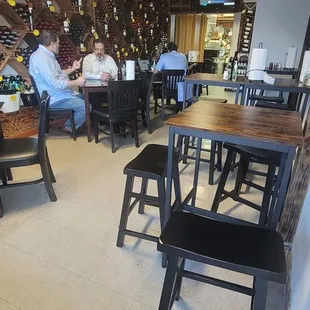 a restaurant with tables and chairs