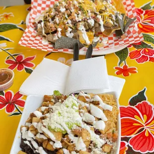 Packed nachos and the (hopefully) healthier chicken burrito bowl. Lots of greatness in both of these