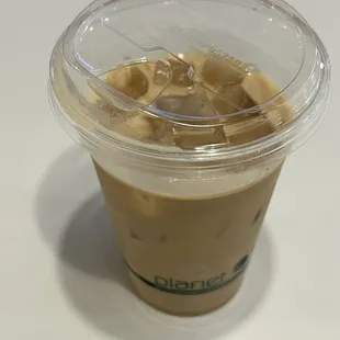 Iced vanilla latte - $6.50 - December 2024