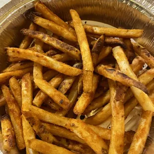 This is there fries they are burnt now after we asked them to cook it more because they were not done!
