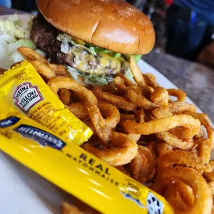The classic cheeseburger  with curly fries