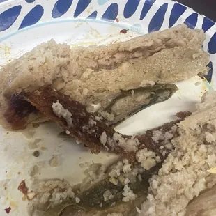 A tamal de rayas that the cheese is hard and crusty.