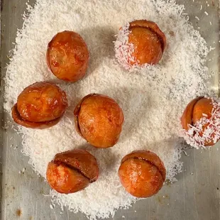 the doughnuts on a baking sheet