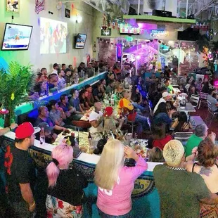 a large group of people in a restaurant