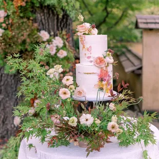 The dreamiest wedding cake thanks to Venus with the most beautiful florals by Max Gill Design; shot by Amanda Crean Photography
