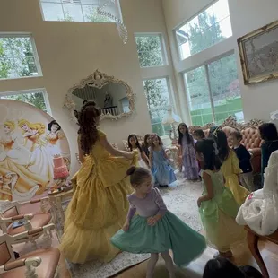 Belle teaching the girls how to dance like a princess
