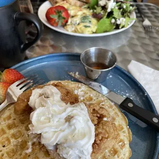 Chicken &amp; waffle, and a spinach-onion-tomato omelette with salad and multigrain toast. Delicioso!
