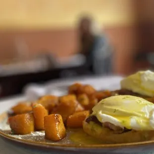 Egg Benedict, butternut squash home fries, home made biscuits