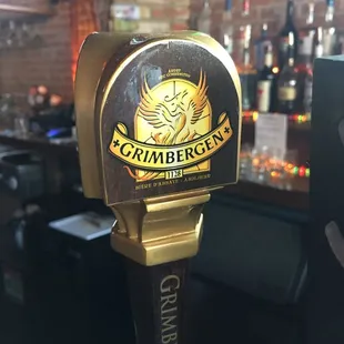 a close up of a beer tap