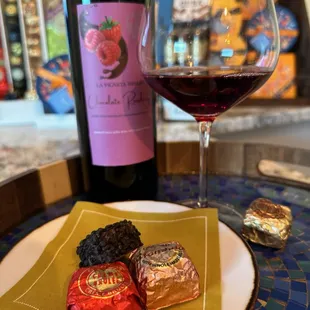 a glass of wine and chocolate